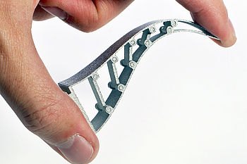 Elastic part produced by additive manufacturing